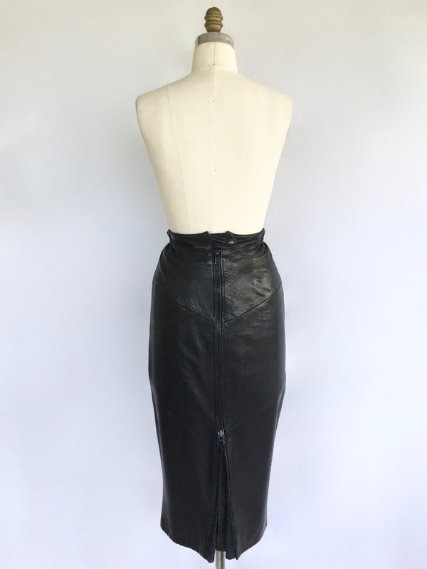 GEORGES DAN 80's VINTAGE black leather midi skirt w/ thick zipper in front, S