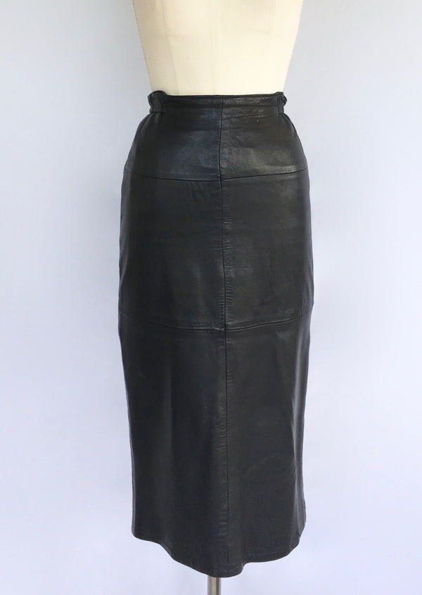 GEORGES DAN 80's VINTAGE black leather midi skirt w/ thick zipper in front, S