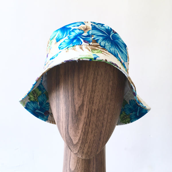 OUTQUEST Kids blue Hawaian flower bucket hat