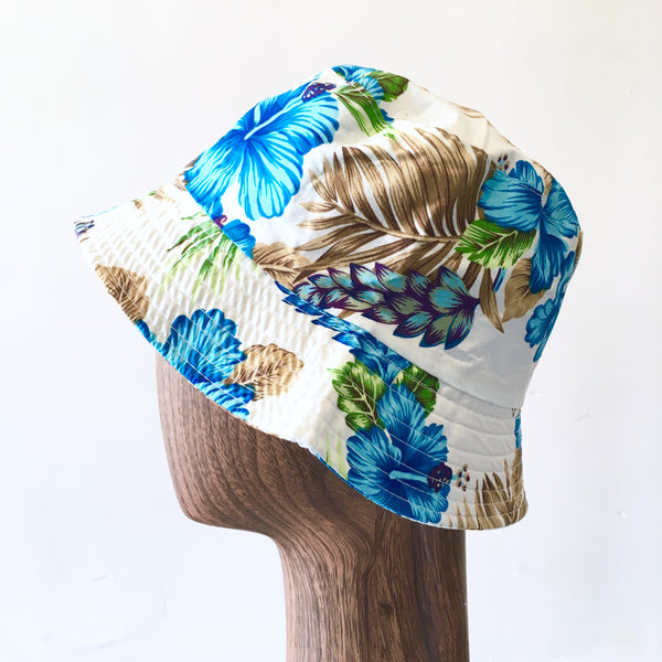 OUTQUEST Kids blue Hawaian flower bucket hat