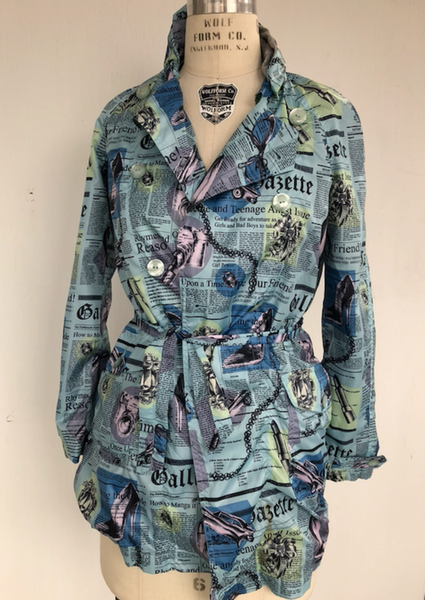 JOHN GALLIANO Girl's blue nylon news print double breasted trench coat w/ belt, 14