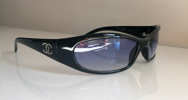 VINTAGE CHANEL black wrap blue lens sunglasses with Swarovski crystal logo