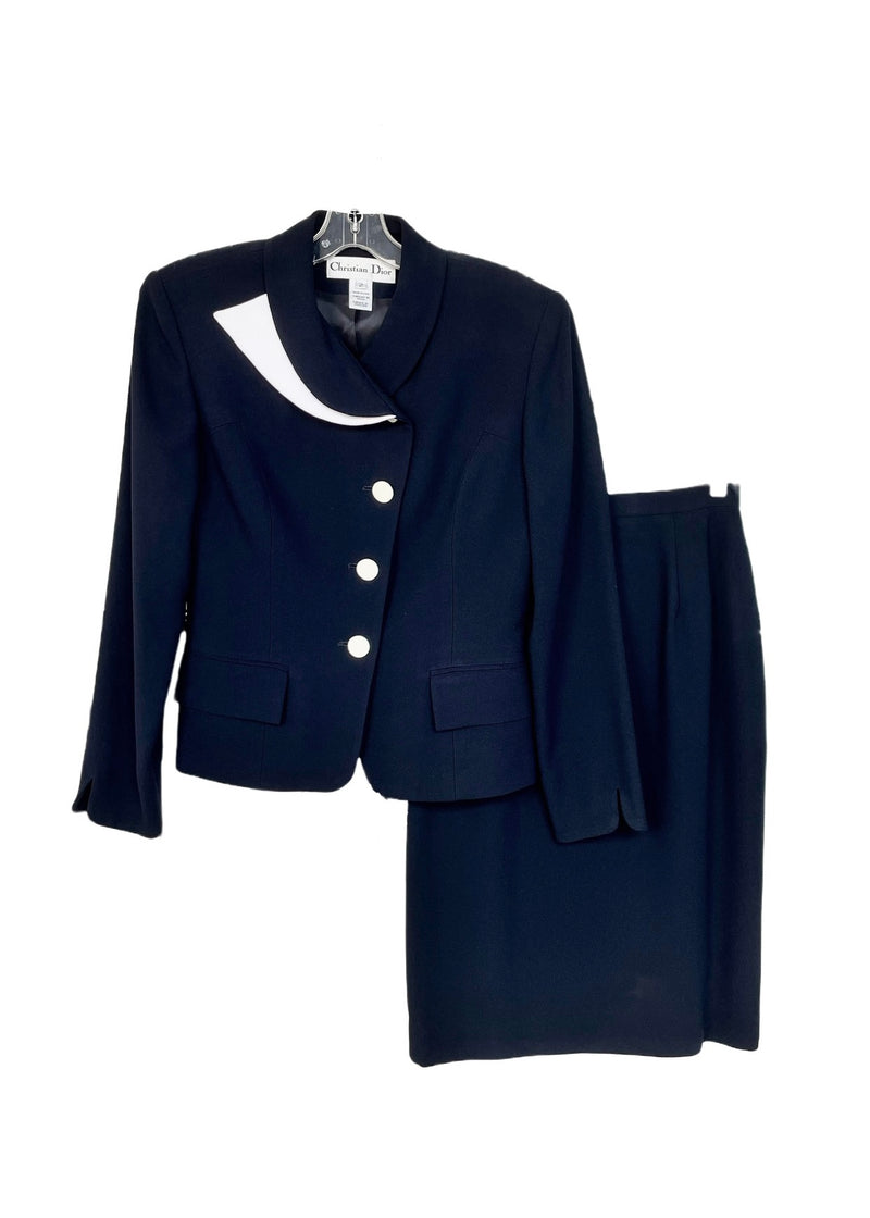 VINTAGE CHRISTIAN DIOR navy crepe suit with asymmetrical white button closure and white trim on shawl collar, 2