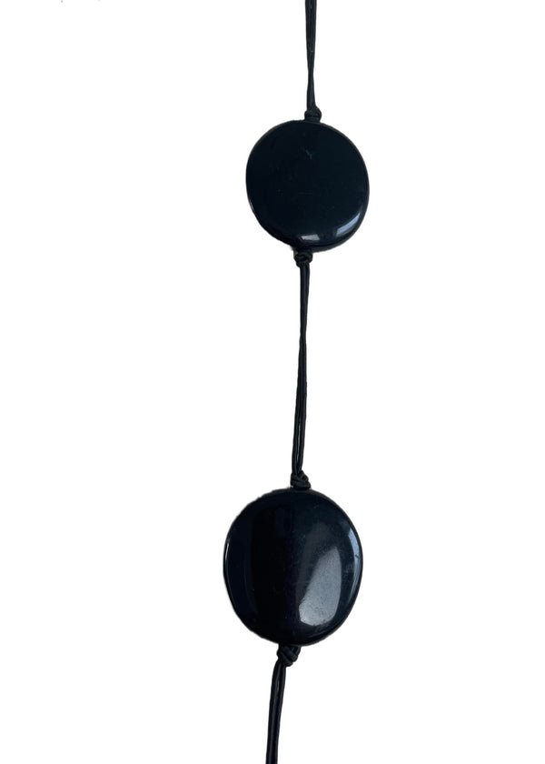 NECKLACE black organically shaped flattish round bead & cord necklace, 17.5” long