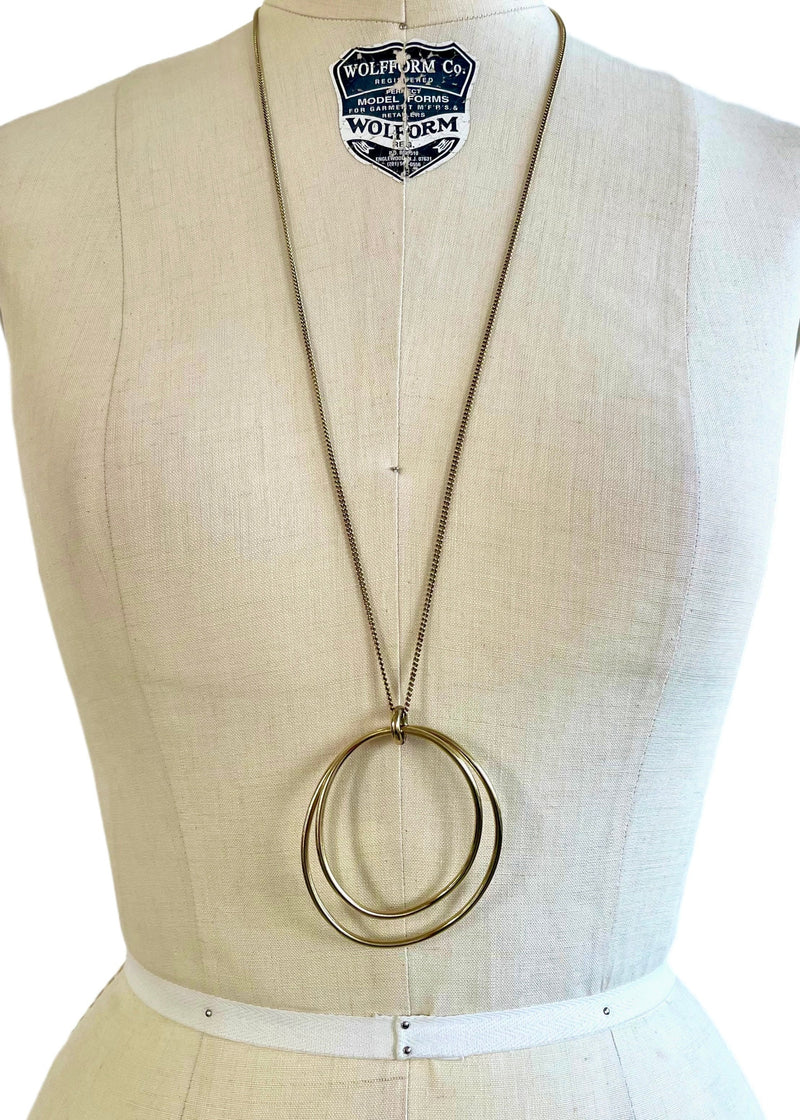 DRYBERG KERN goldtone double free form circle pendant necklace, 18" long
