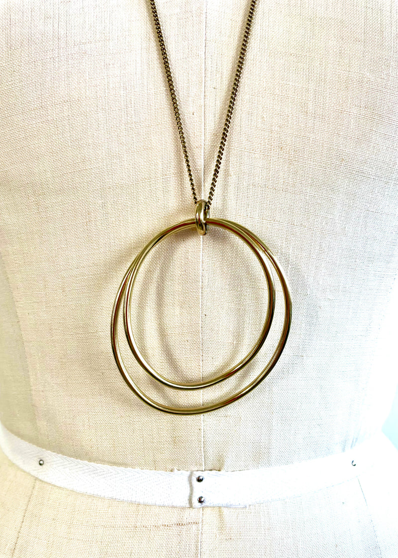 DRYBERG KERN goldtone double free form circle pendant necklace, 18" long