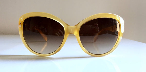 PRADA canary oval oversized sunglasses w/ logo on side temples