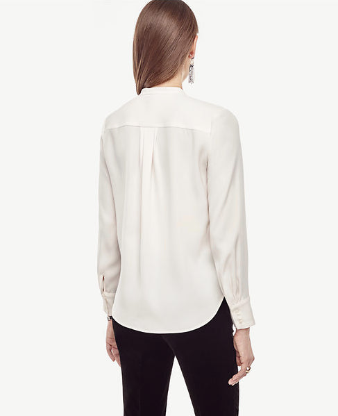 ANN TAYLOR Women's cream blouse with black piped ruffles, S