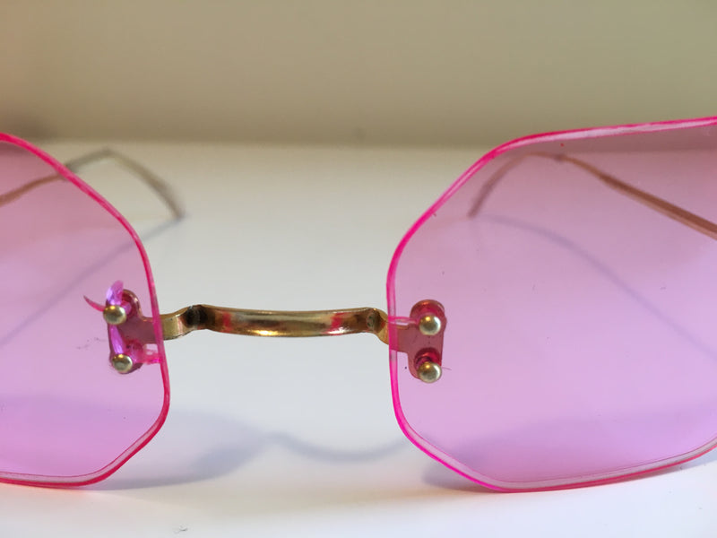 VINTAGE frameless pink plastic lens glasses with gold metal arms